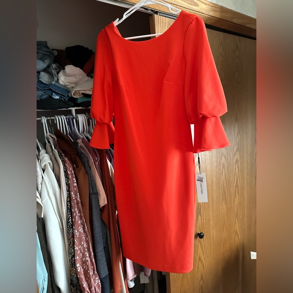 Calvin Klein Midi dress soft and stretchy ginger is the color. New with tags